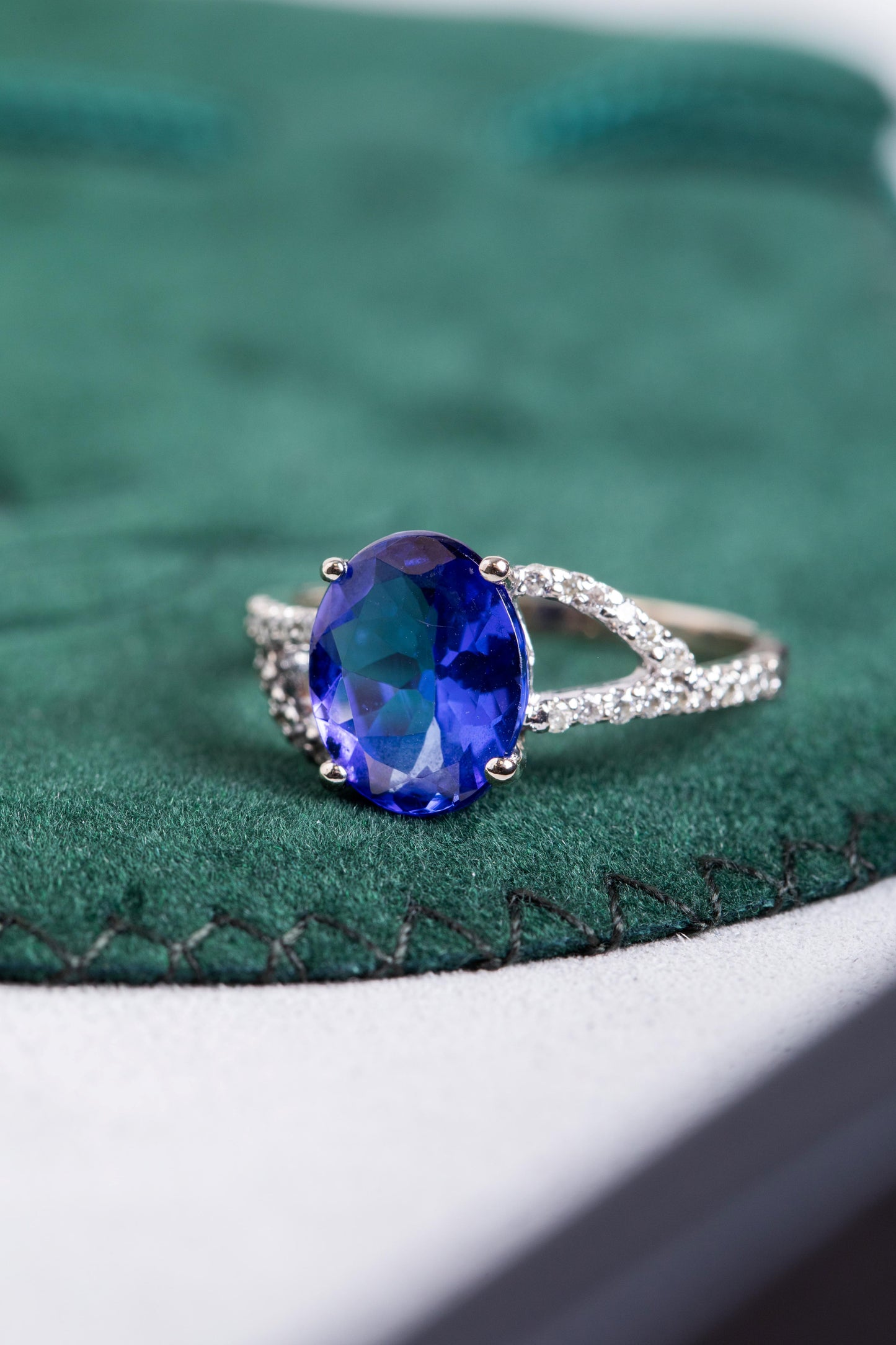 Oval Tanzanite with Diamond set split shoulders Ring