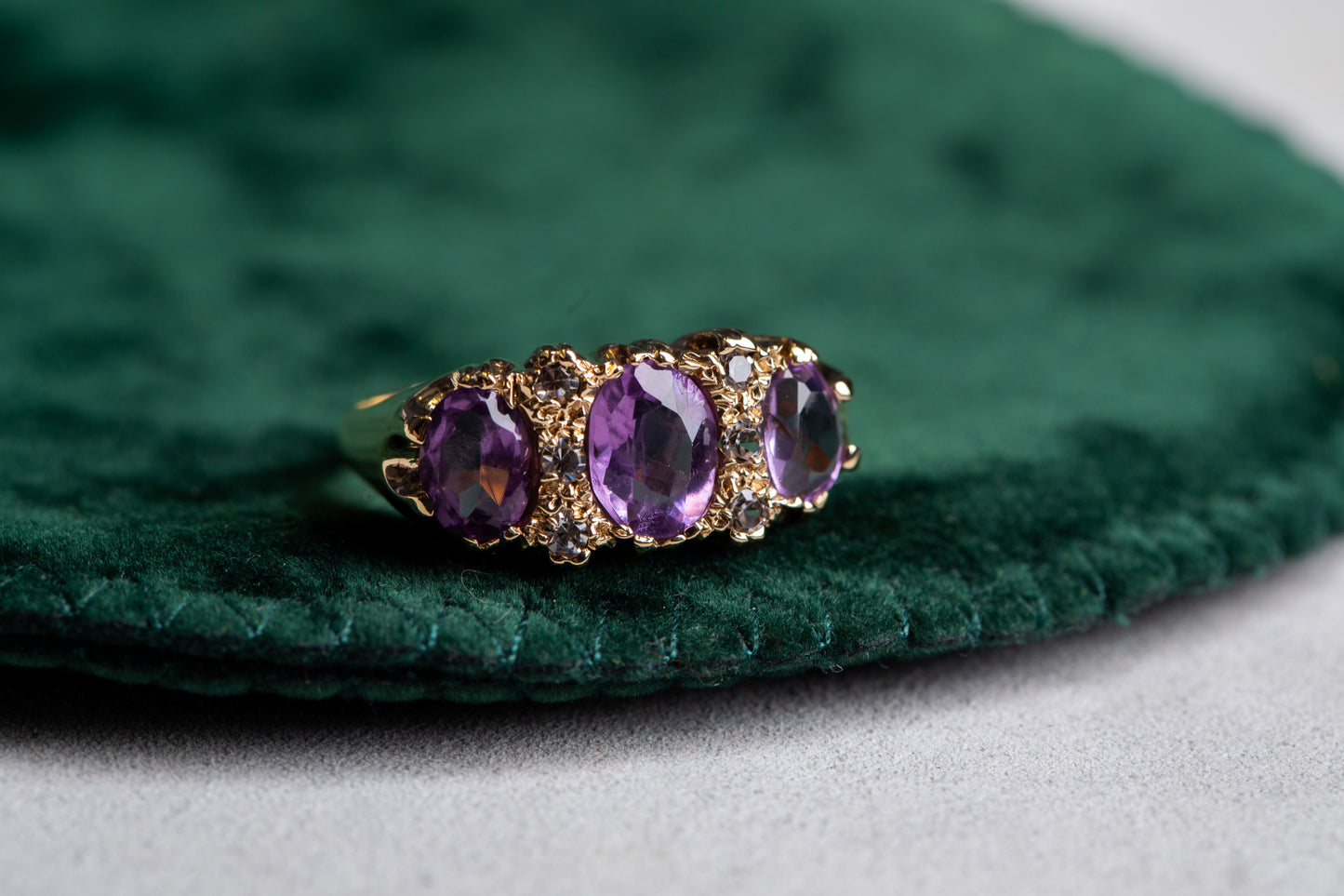 Oval Shaped Amethyst and Round Brilliant Cut Diamond Dress Ring