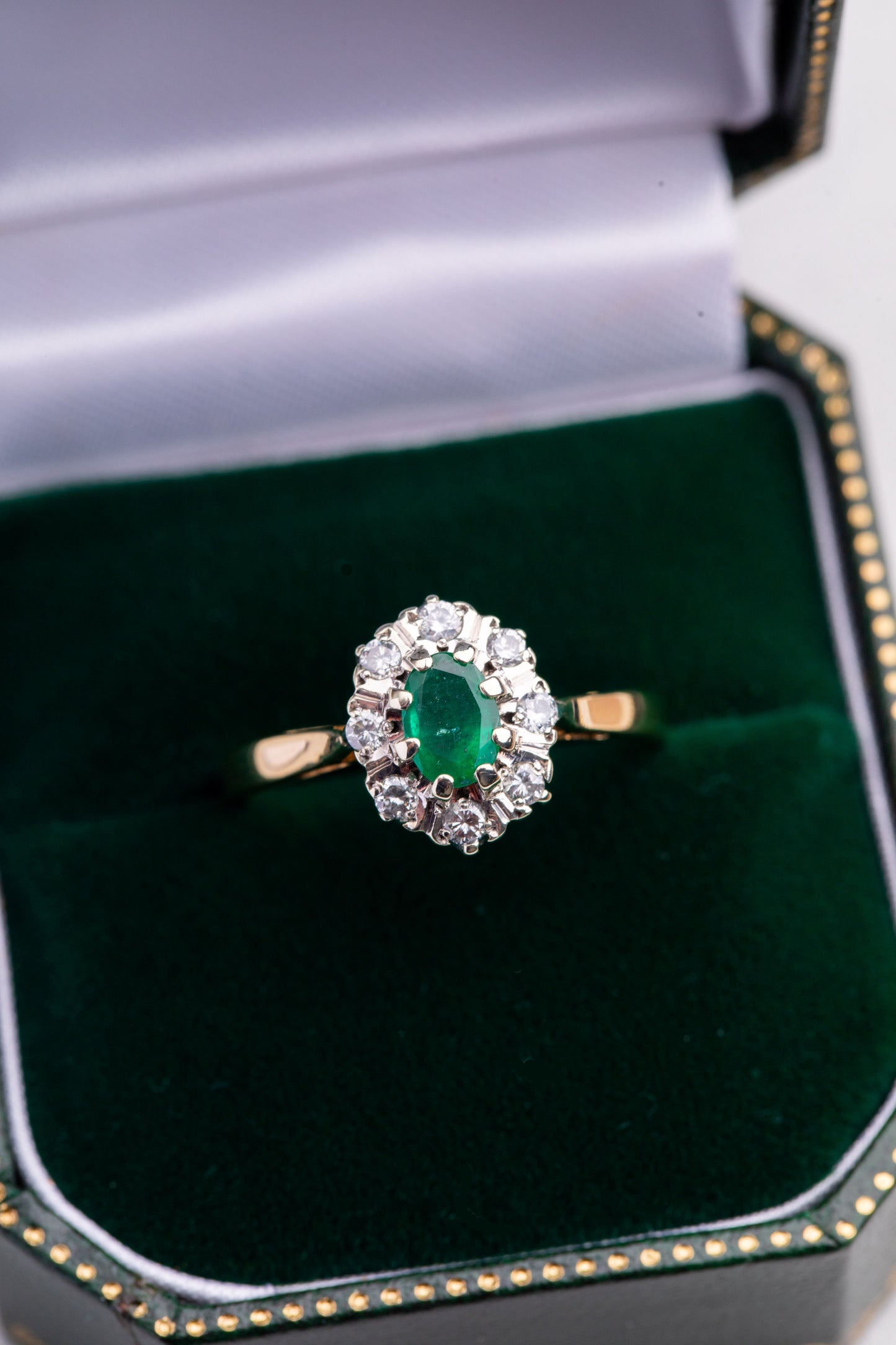 Oval Emerald and Diamond Cluster Ring