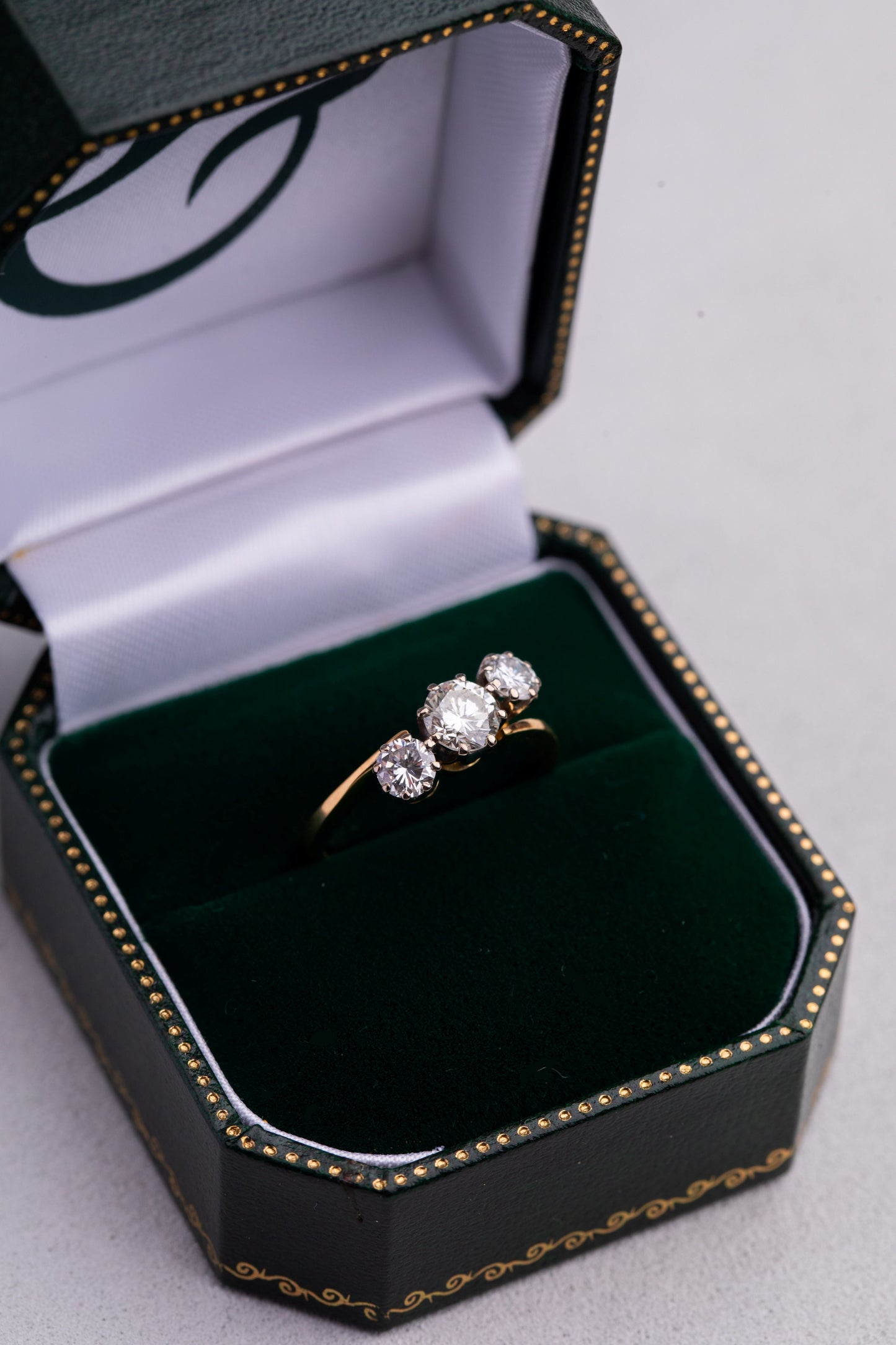 Round Brilliant Cut Diamond 3 Stone Twist Style Ring