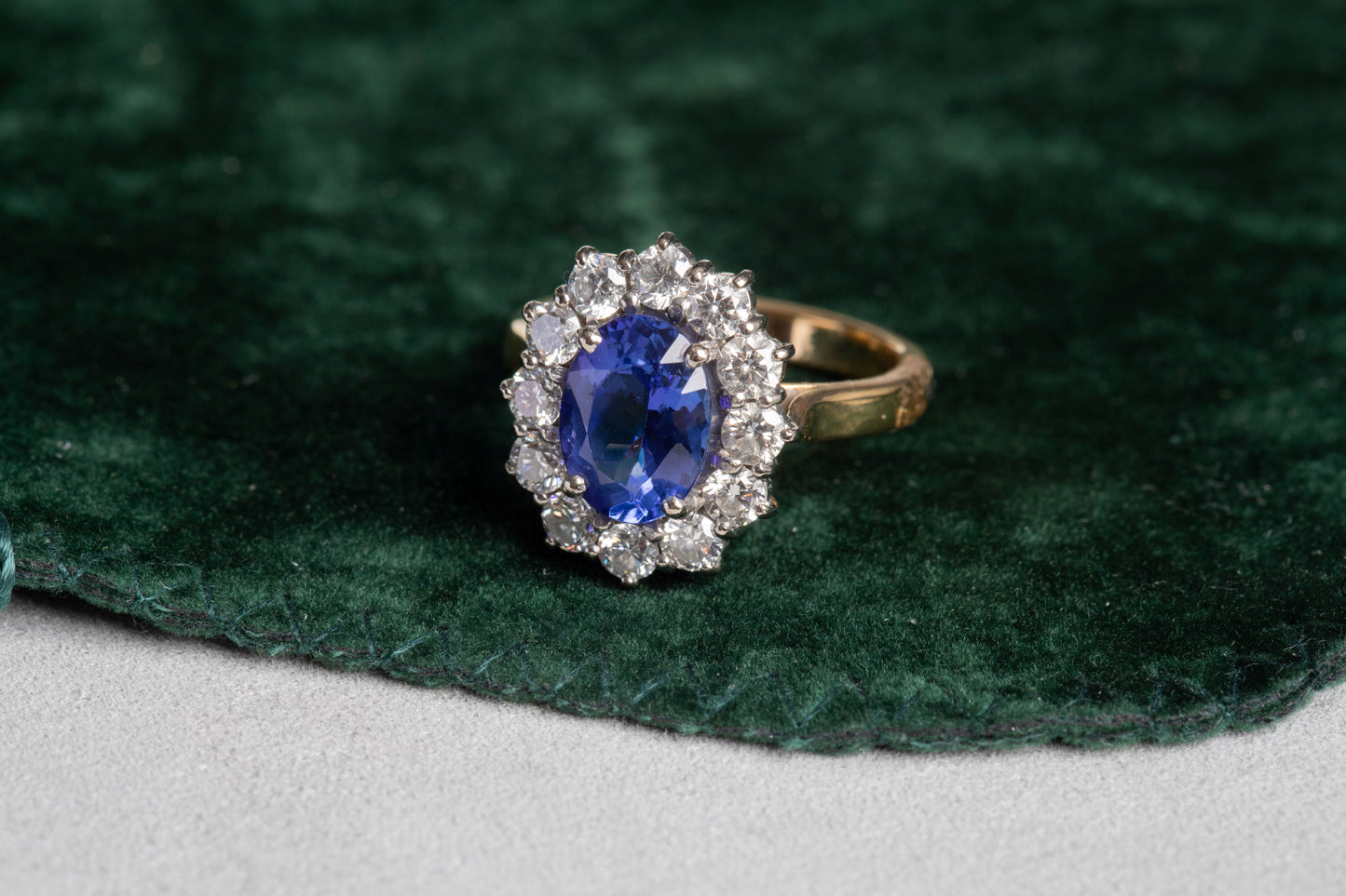 Tanzanite and Round Brilliant Cut Diamond Cluster Ring