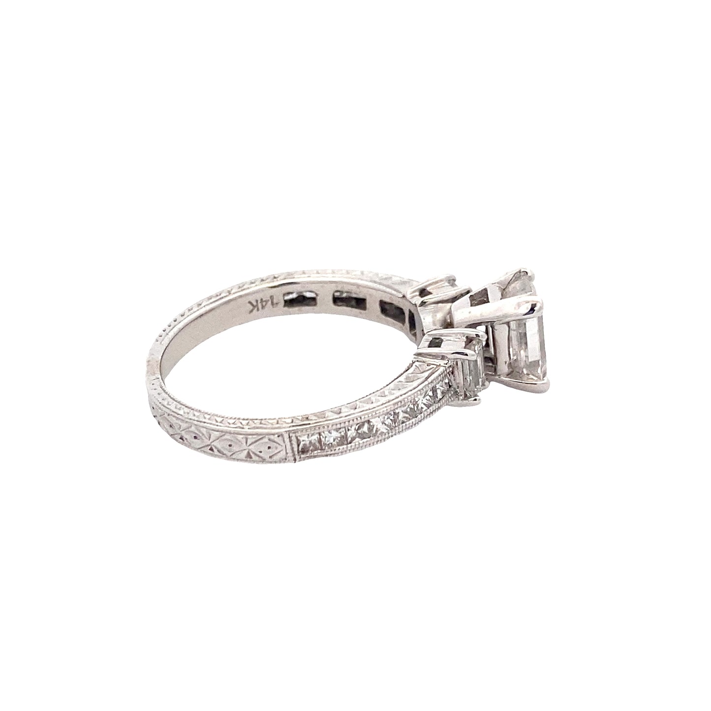 Emerald Cut Diamond 3 Stone Ring with Princess Cut Diamond set shoulders