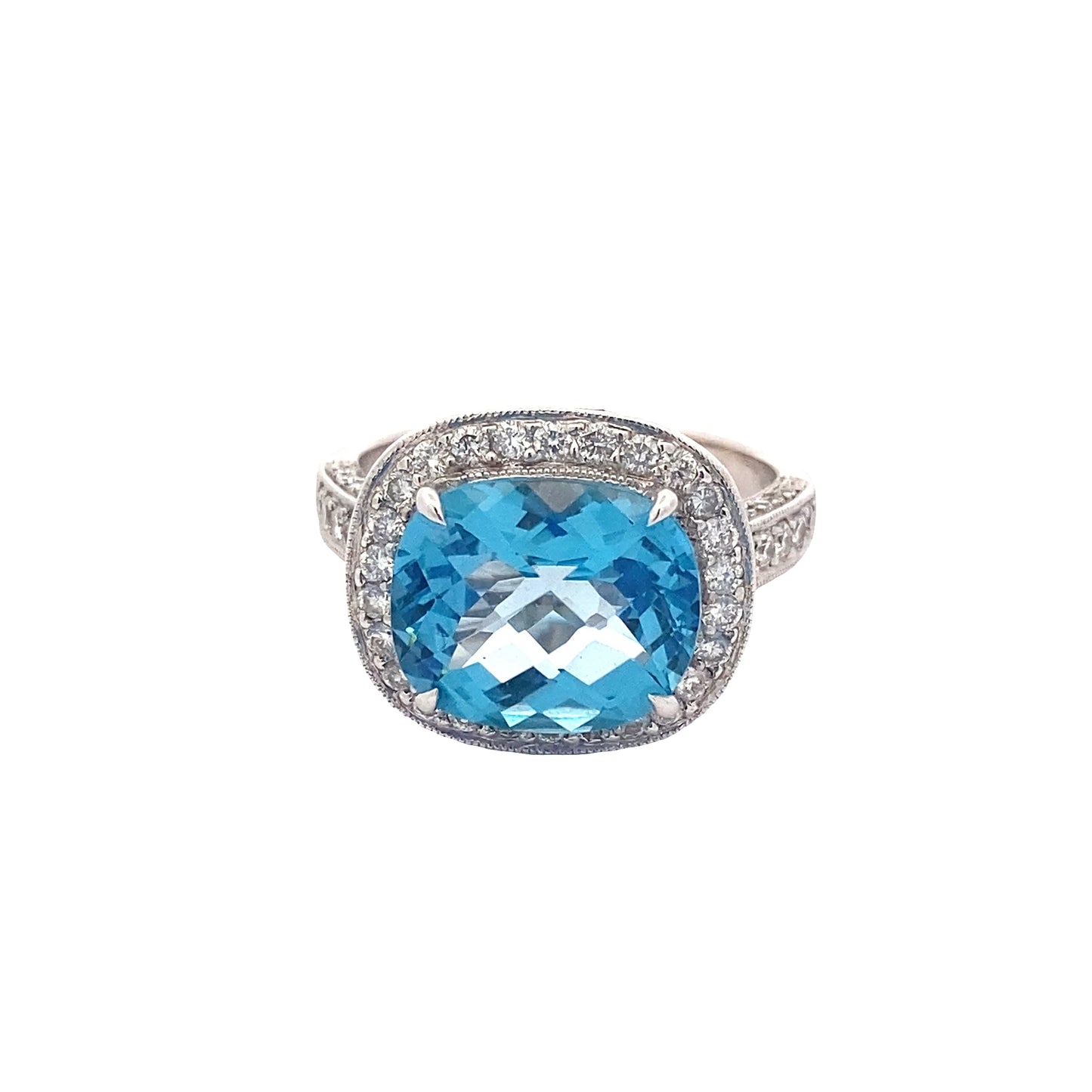 Blue Topaz with halo of Diamonds and Diamond set shoulders Ring