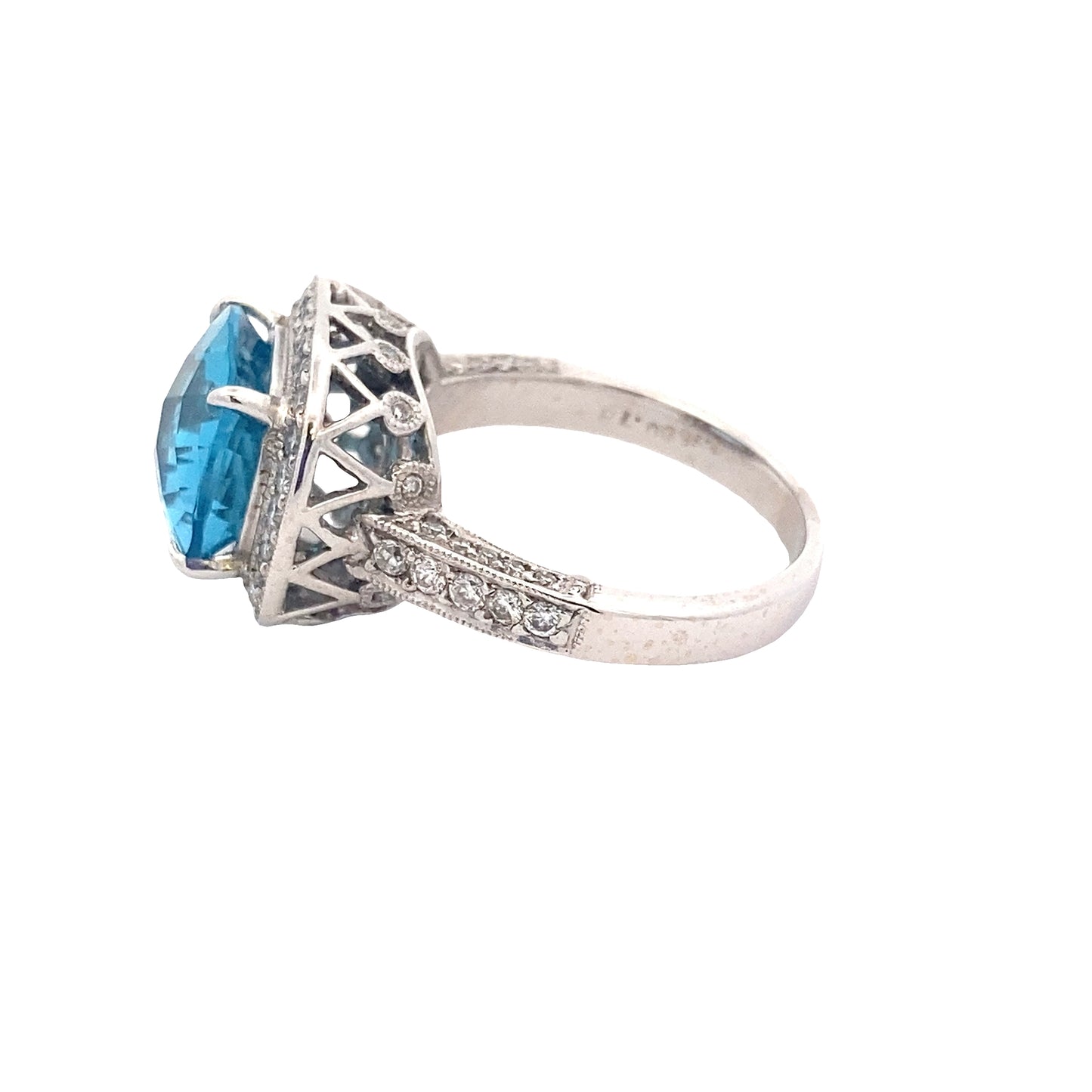 Blue Topaz with halo of Diamonds and Diamond set shoulders Ring