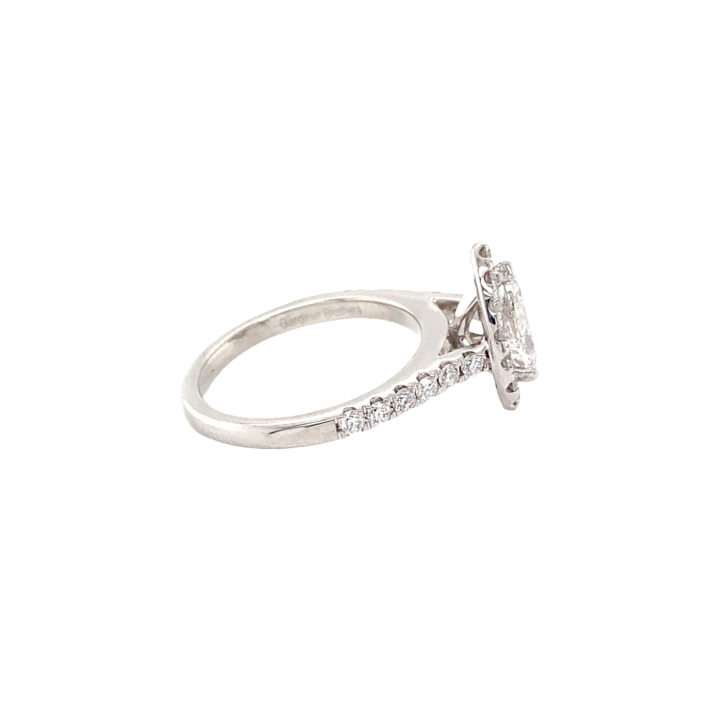 Pear Cut Diamond with halo and Diamond set shoulders