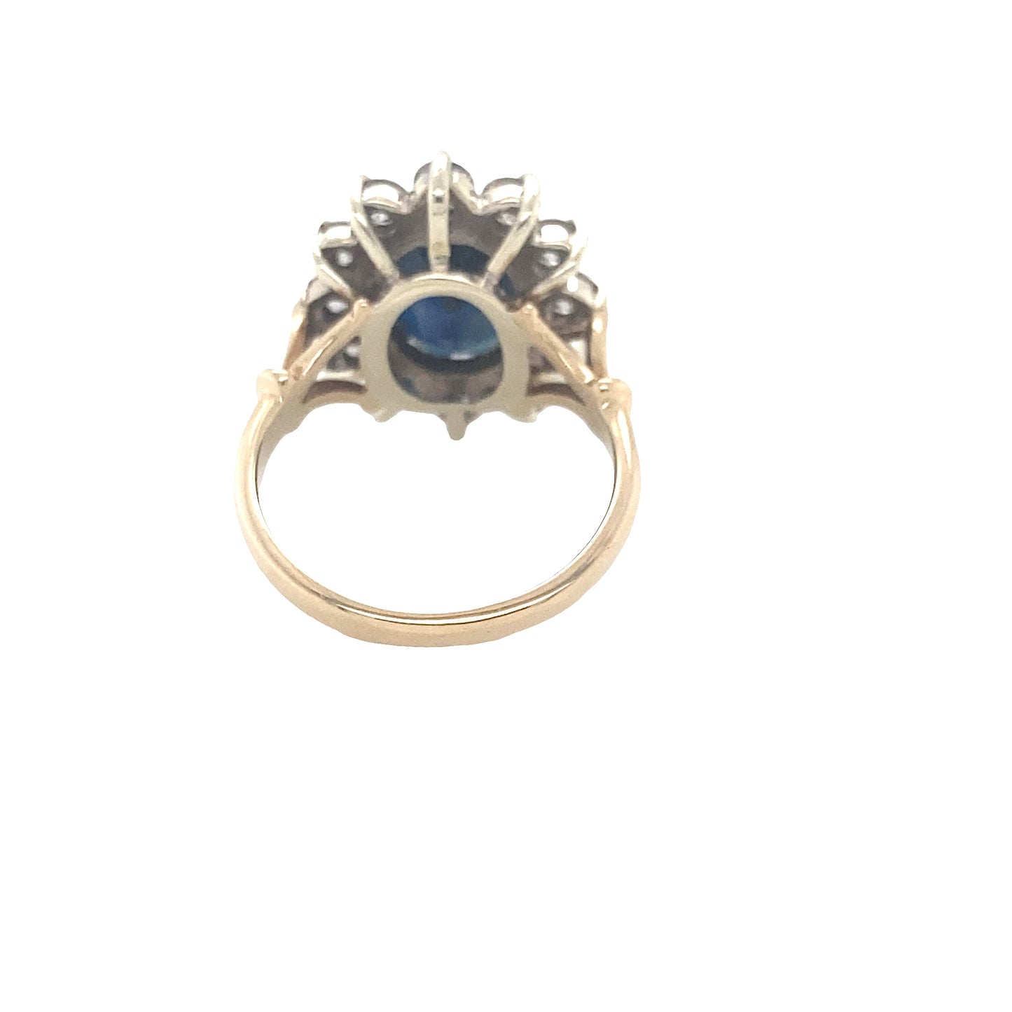 Oval Sapphire and Round Brilliant Cut Diamond Cluster Ring
