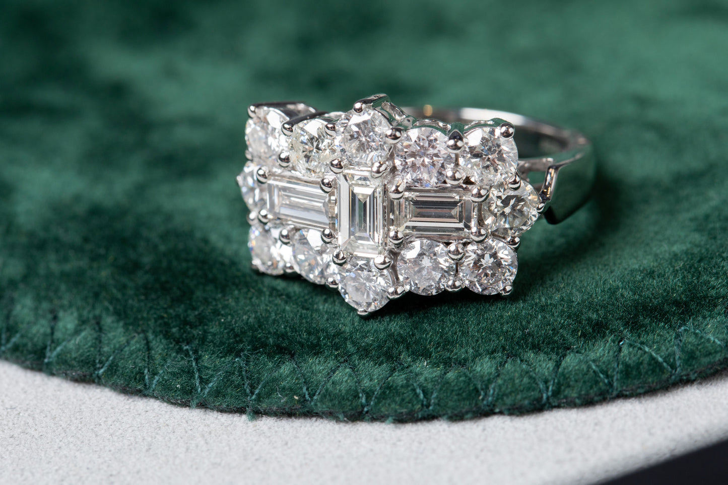 Emerald and Round Brilliant Cut Diamond Cluster Ring