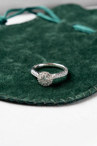 Round Brilliant Cut Diamond Halo Ring with Diamond set shoulders