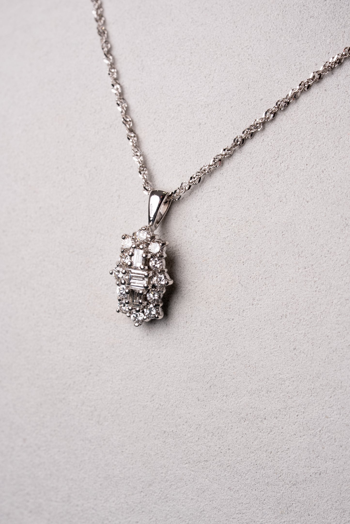 Emerald Cut and Round Brilliant Cut Diamond Cluster Pendant on White Gold chain