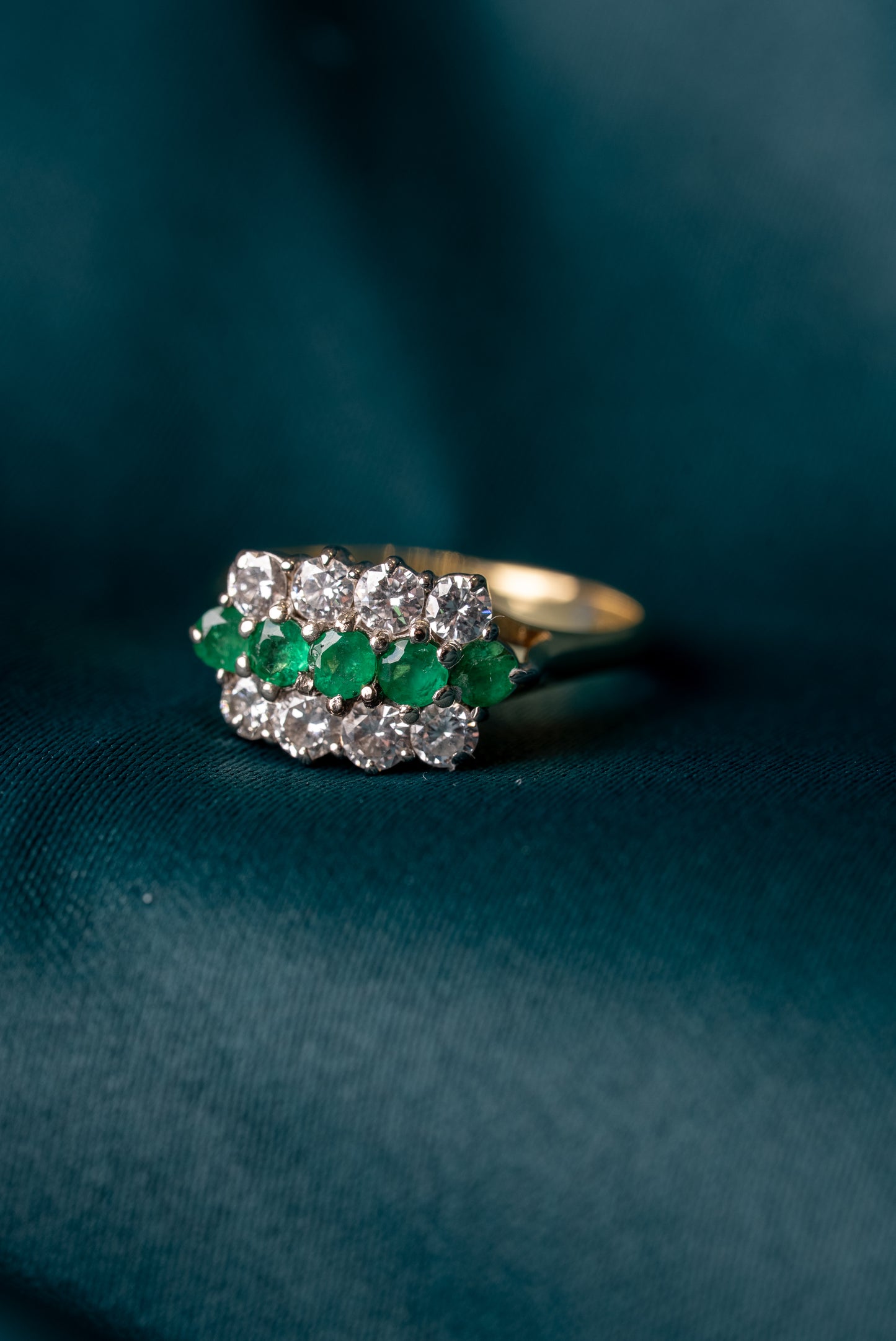Emerald and Round Brilliant Cut Diamond Cluster