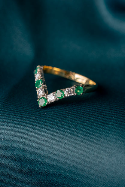 Emerald and Round Brilliant Cut Diamond
