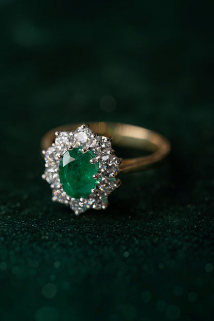 Oval Emerald and Round Brilliant Cut Cluster Ring