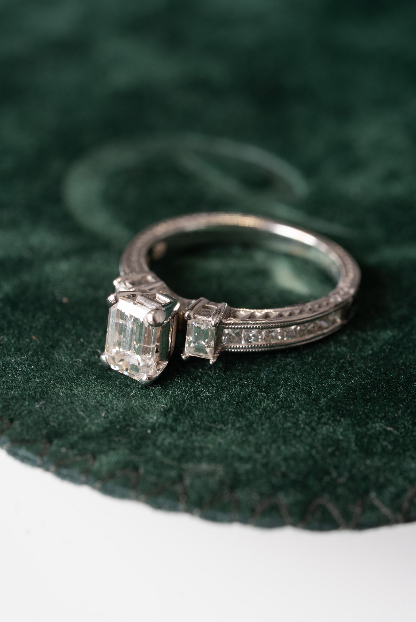 Emerald Cut Diamond 3 Stone Ring with Princess Cut Diamond set shoulders