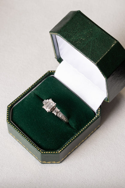 Emerald Cut Diamond 3 Stone Ring with Princess Cut Diamond set shoulders
