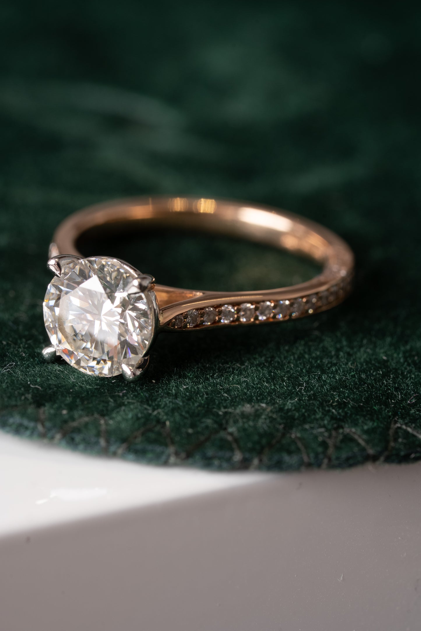 Round Brilliant Cut Diamond Solitaire with Diamond set shoulders