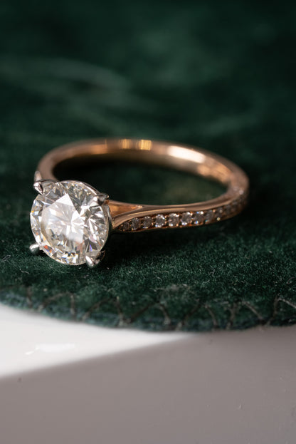 Round Brilliant Cut Diamond Solitaire with Diamond set shoulders