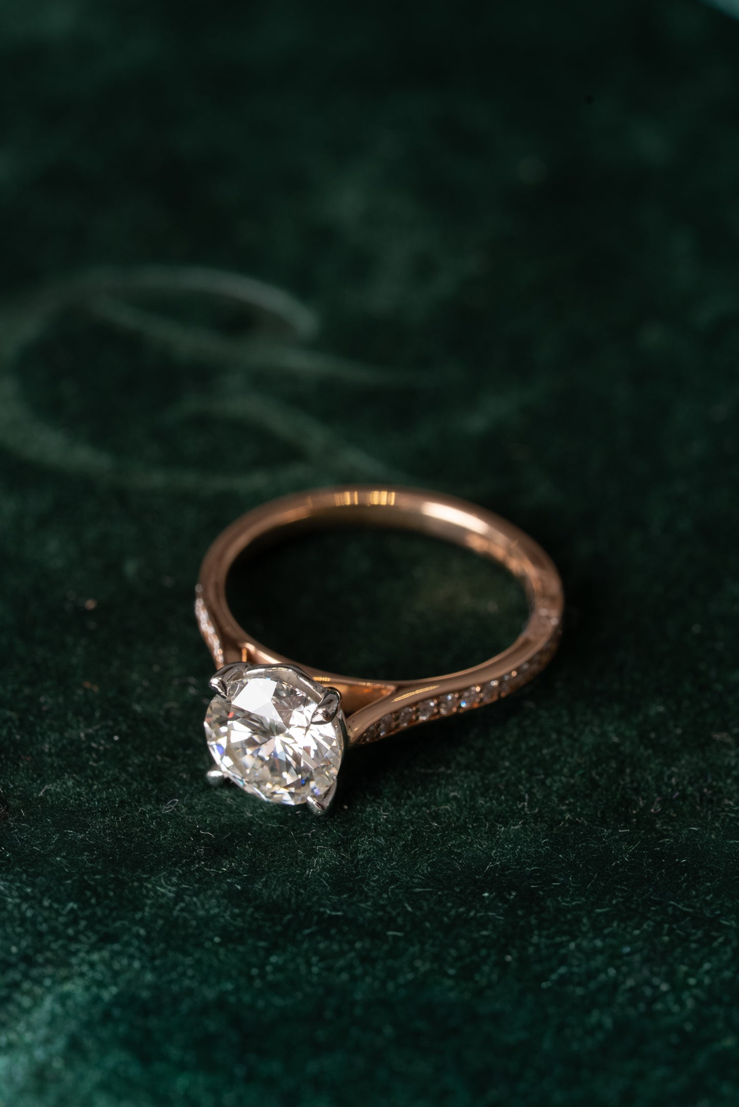 Round Brilliant Cut Diamond Solitaire with Diamond set shoulders