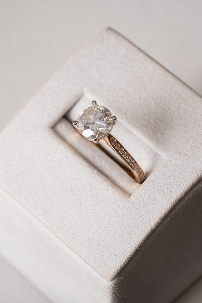 Round Brilliant Cut Diamond Solitaire with Diamond set shoulders