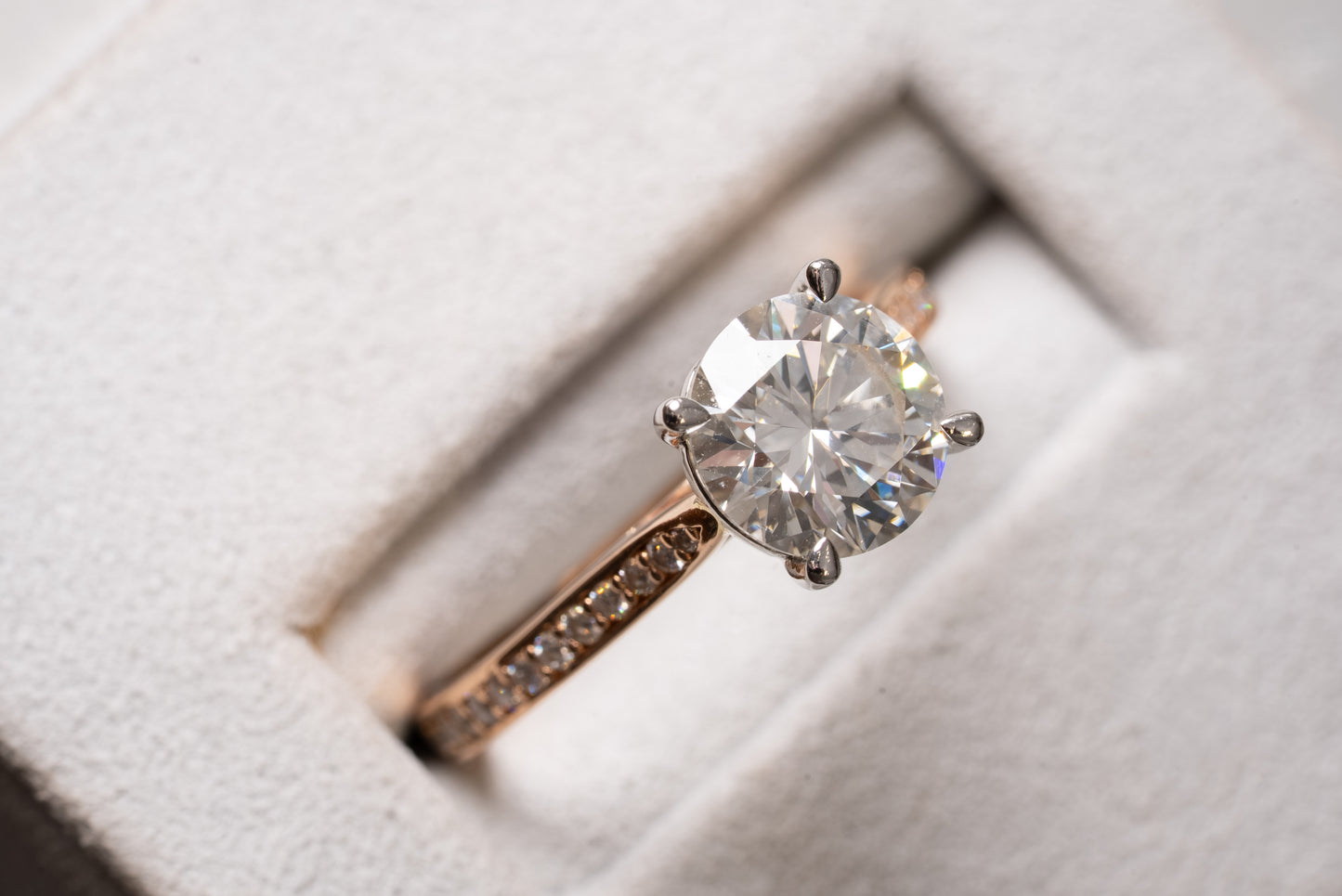 Round Brilliant Cut Diamond Solitaire with Diamond set shoulders