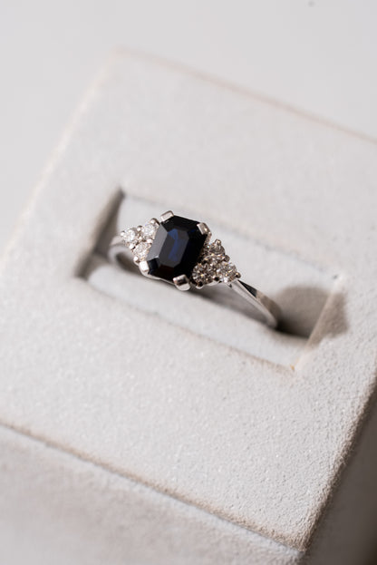 Sapphire and 6 Round Brilliant Cut Diamond Ring