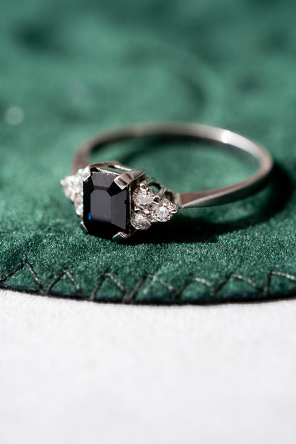 Sapphire and 6 Round Brilliant Cut Diamond Ring