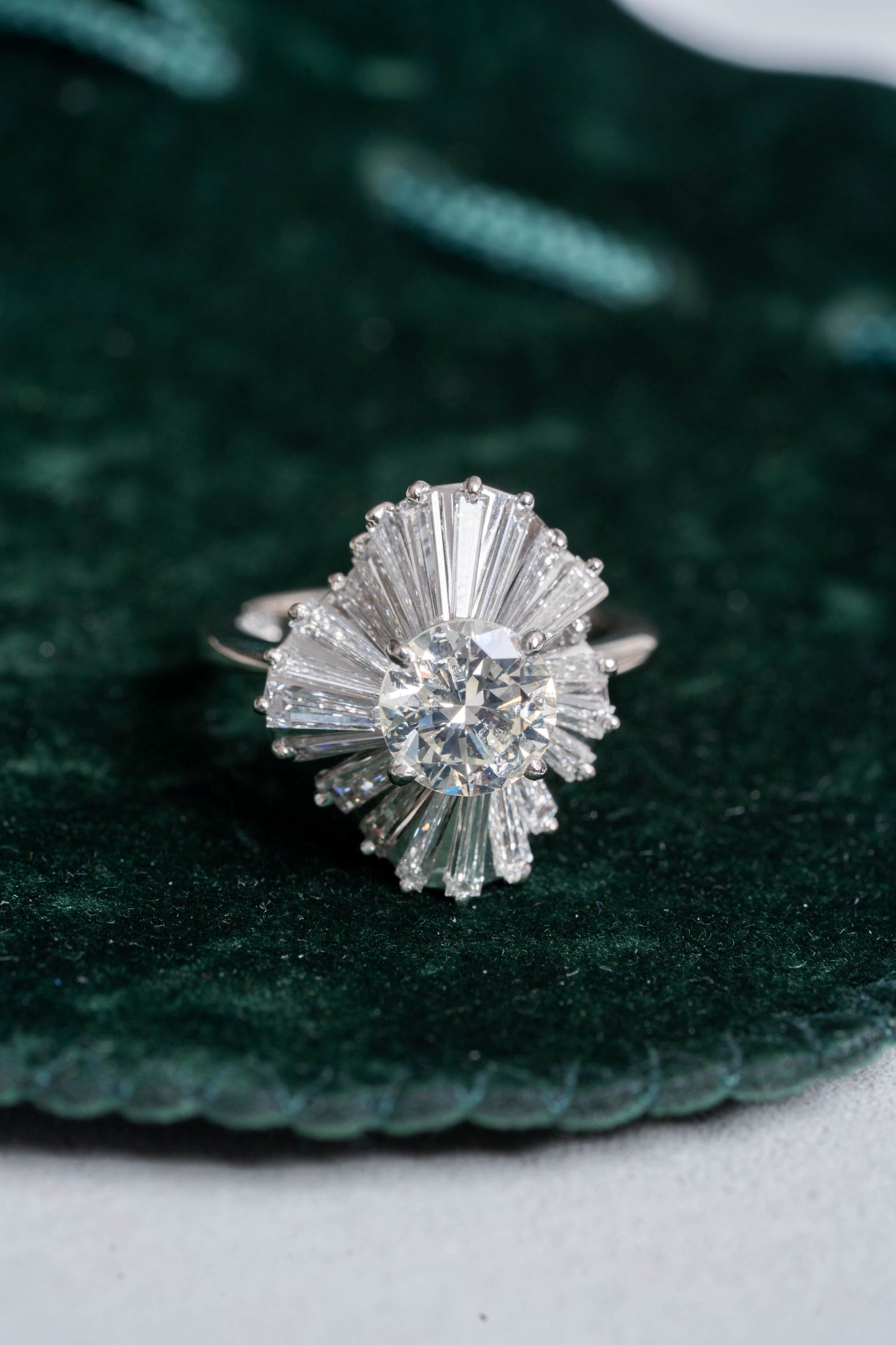 Round Brilliant Cut and Baguette Cut Diamond Ring