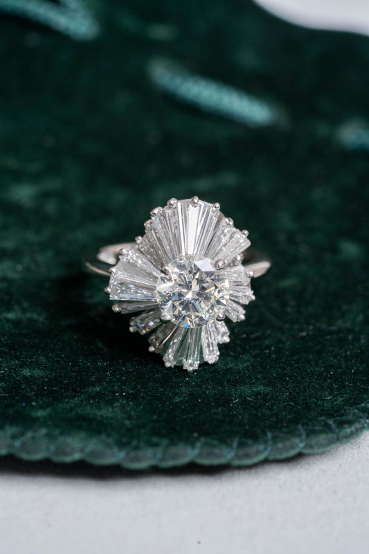 Round Brilliant Cut and Baguette Cut Diamond Ring