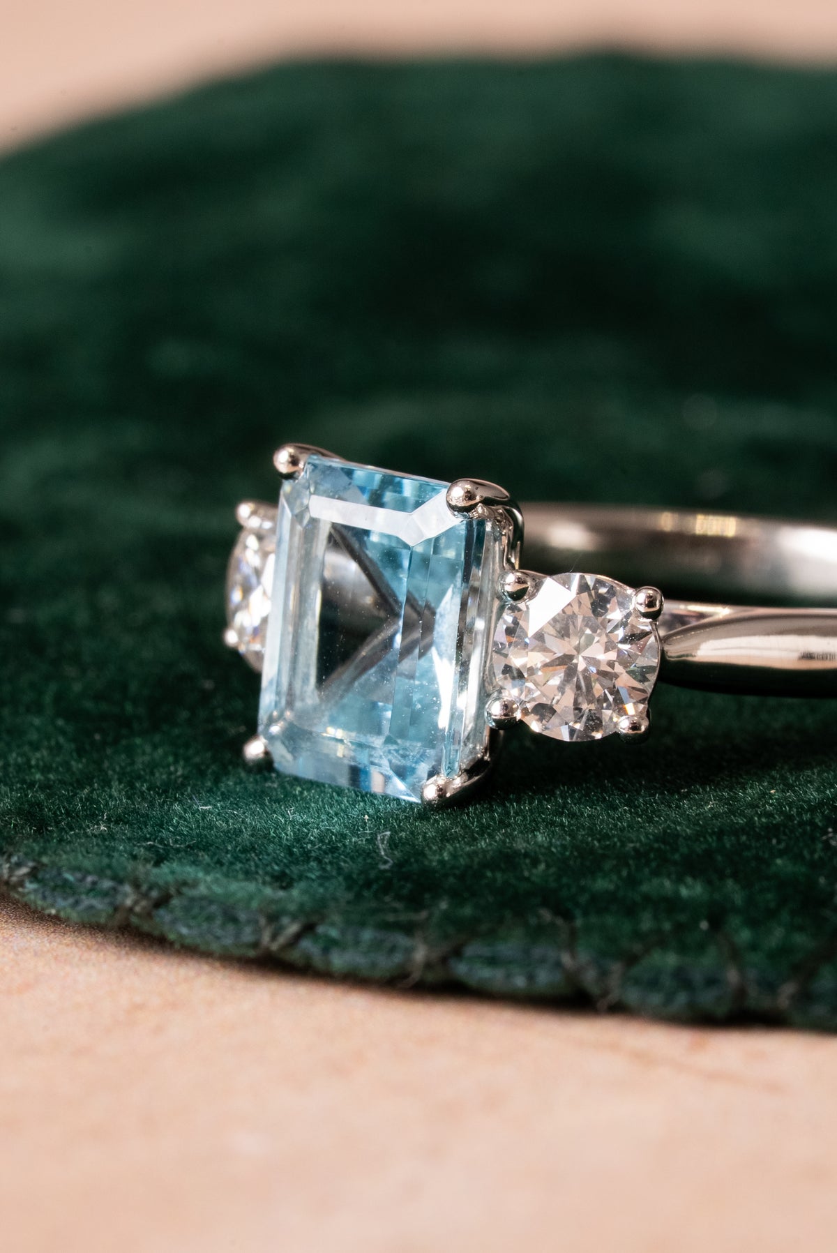 Octagonal Aquamarine and Round Brilliant Cut Diamond 3 Stone Ring