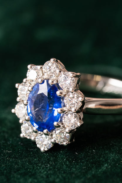 Platinum, Oval Shaped Sapphire with Round Brilliant Cut Diamonds