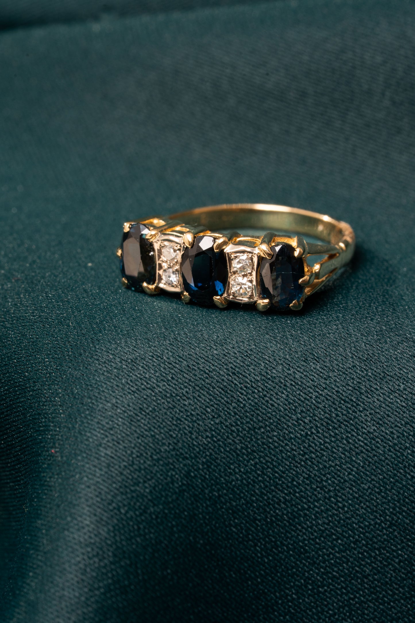Oval shaped Sapphire and Round Brilliant Cut Diamond Ring