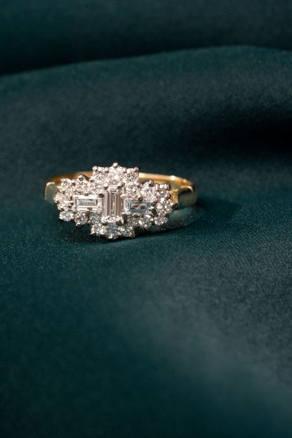 Emerald and Round Brilliant Cut Diamond Boat style cluster ring