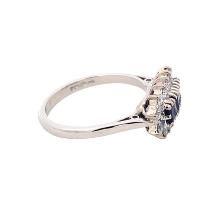 Sapphire and Round Brilliant Cut Diamond Cluster Ring