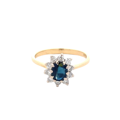 Sapphire and Round Brilliant Cut Diamond Cluster Ring