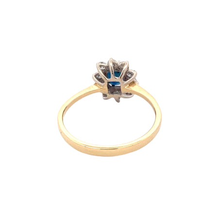 Sapphire and Round Brilliant Cut Diamond Cluster Ring