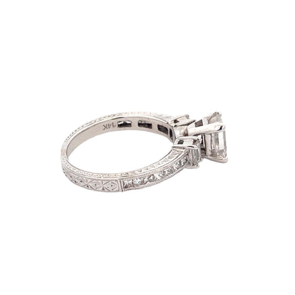 Emerald Cut Diamond 3 Stone Ring with Princess Cut Diamond set shoulders