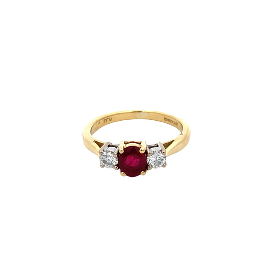 Oval Ruby and Round Brilliant Cut Diamond 3 Stone Ring