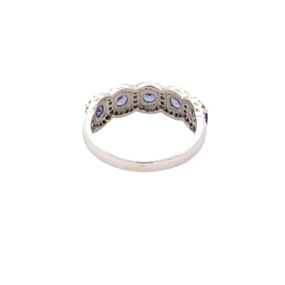 Tanzanite and Round Brilliant Cut Diamond Halo Cluster Ring