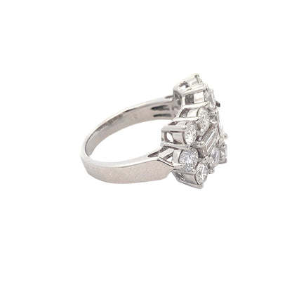 Emerald and Round Brilliant Cut Diamond Cluster Ring