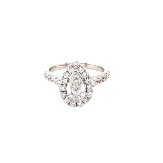 Pear Cut Diamond with halo and Diamond set shoulders