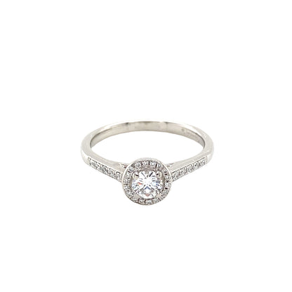 Round Brilliant Cut Diamond Halo Ring with Diamond set shoulders