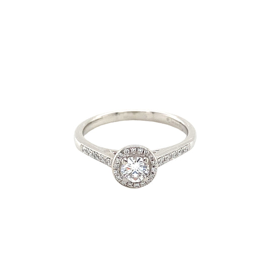 Round Brilliant Cut Diamond Halo Ring with Diamond set shoulders