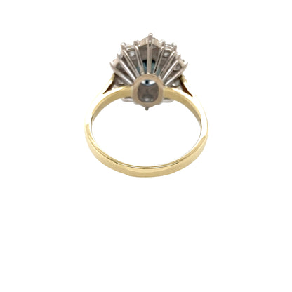 Oval Sapphire and Round Brilliant Cut Diamond Cluster Ring