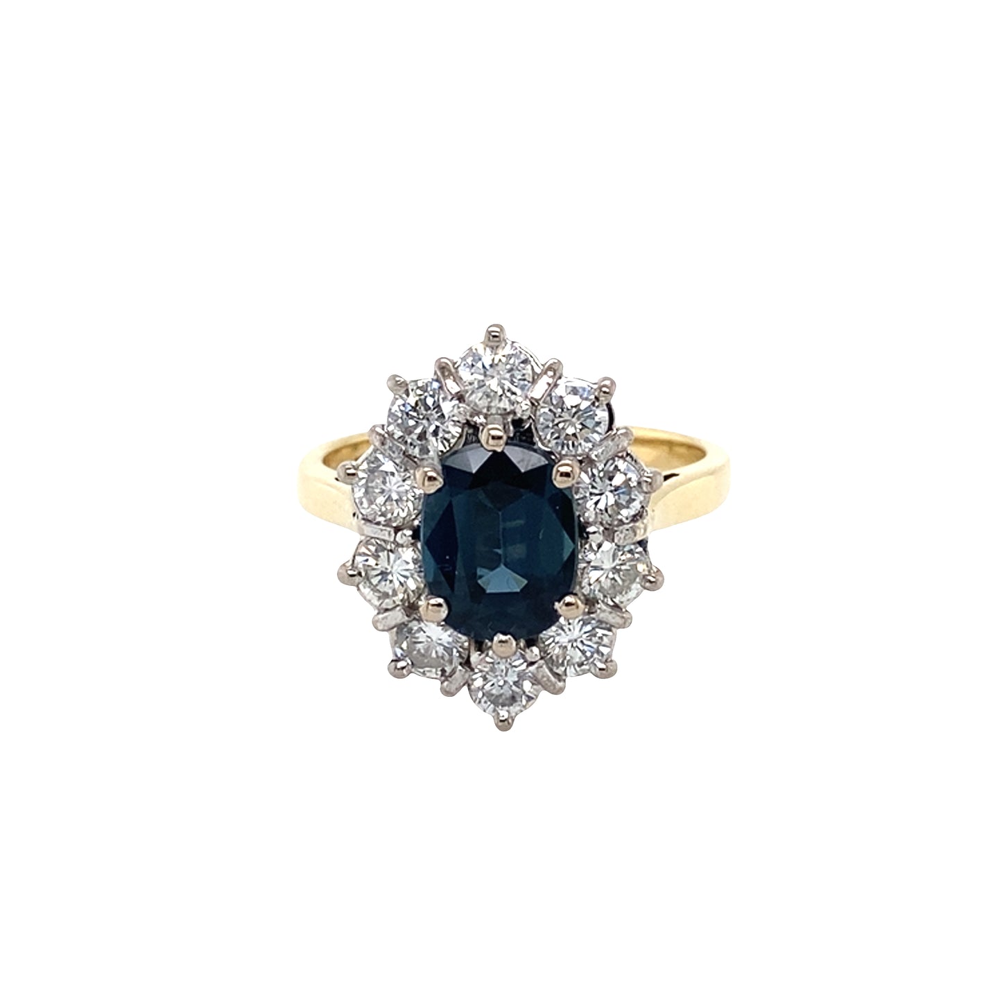 Oval Sapphire and Round Brilliant Cut Diamond Cluster Ring