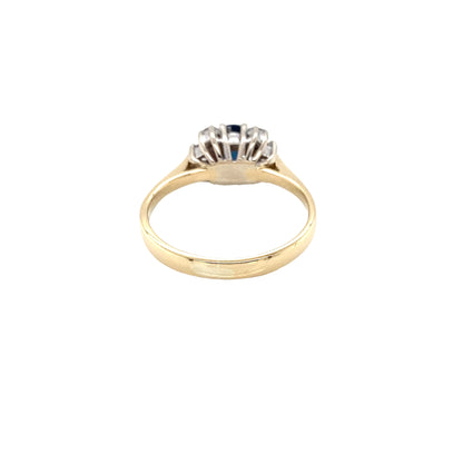 Oval Sapphire and Round Brilliant Cut Diamond Cluster Ring