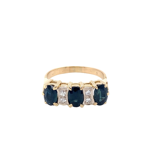 Oval shaped Sapphire and Round Brilliant Cut Diamond Ring