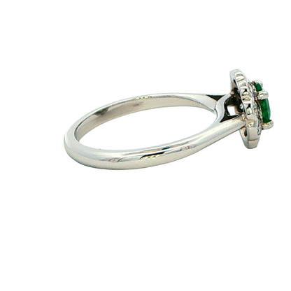 Round Emerald and Round Brilliant Cut Diamond Cluster Ring