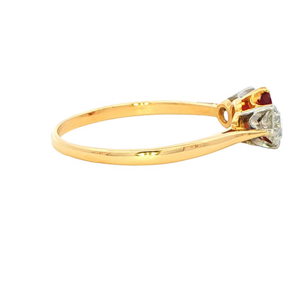 Oval Ruby and Round Brilliant Cut Diamond 3 Stone Ring