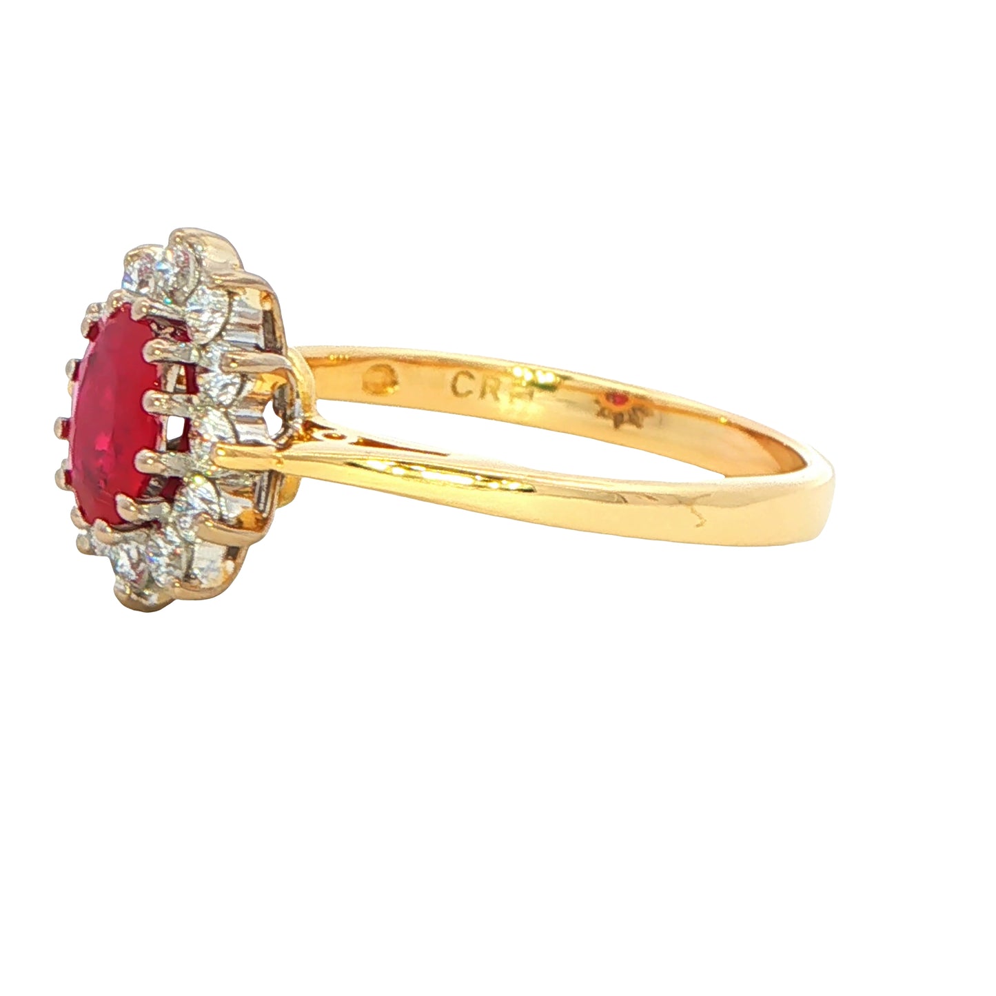 Oval Ruby and Round Brilliant Cut Diamond Cluster Style Ring