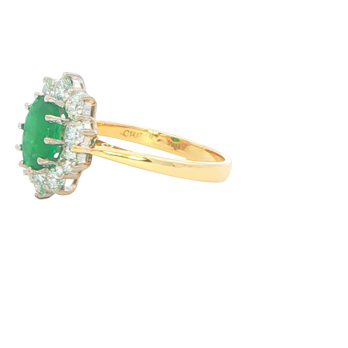 Oval Emerald and Round Brilliant Cut Cluster Ring
