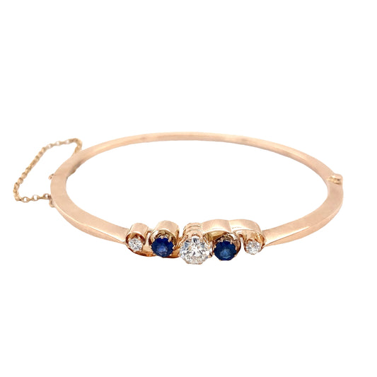 Yellow Gold Diamond and Sapphire Bangle with safety chain